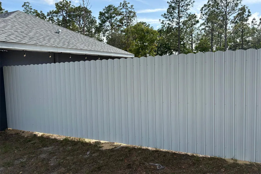 White PVC backyard fence at a Florida home