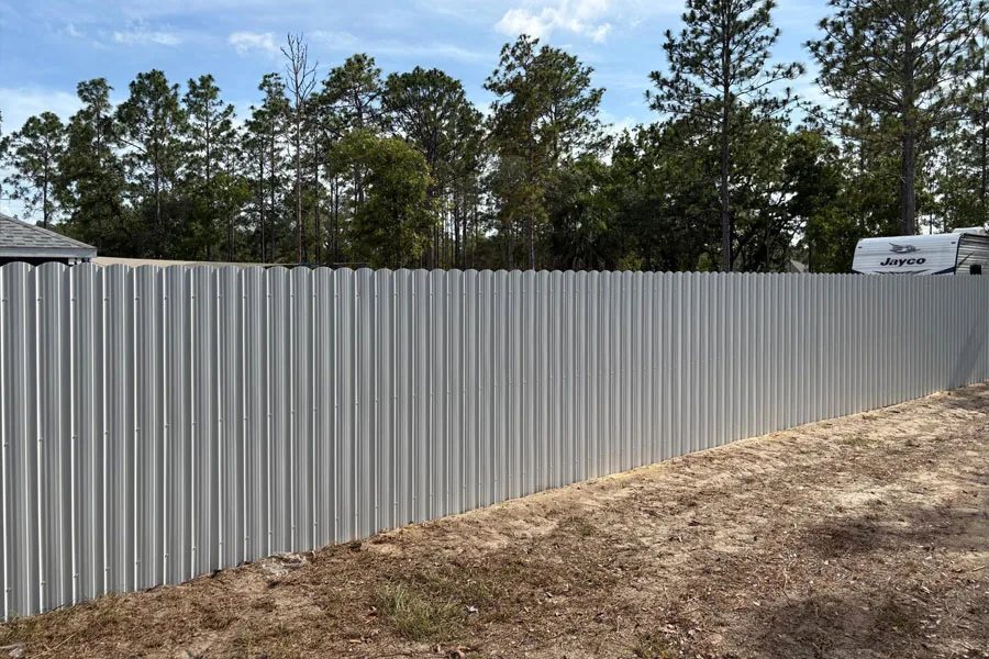 White PVC side-yard privacy fence