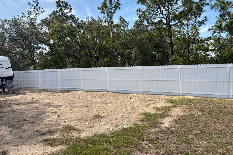 White PVC fencing along a residential property