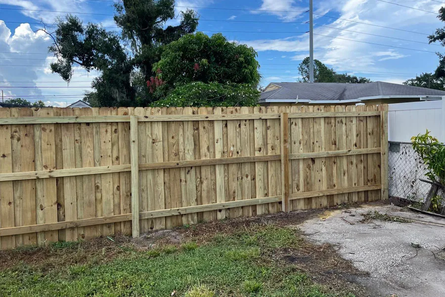 Completed natural wood privacy fence