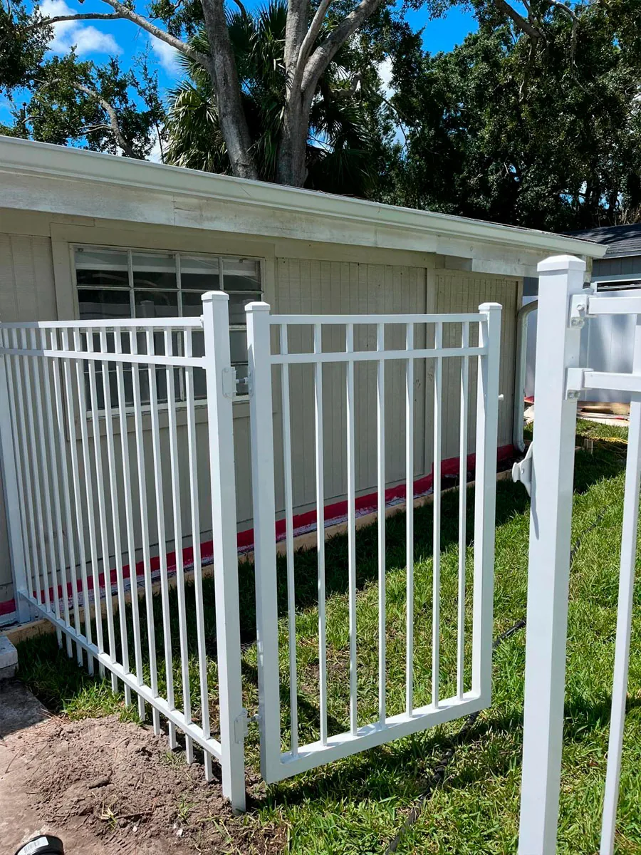 White aluminum gate at a residence