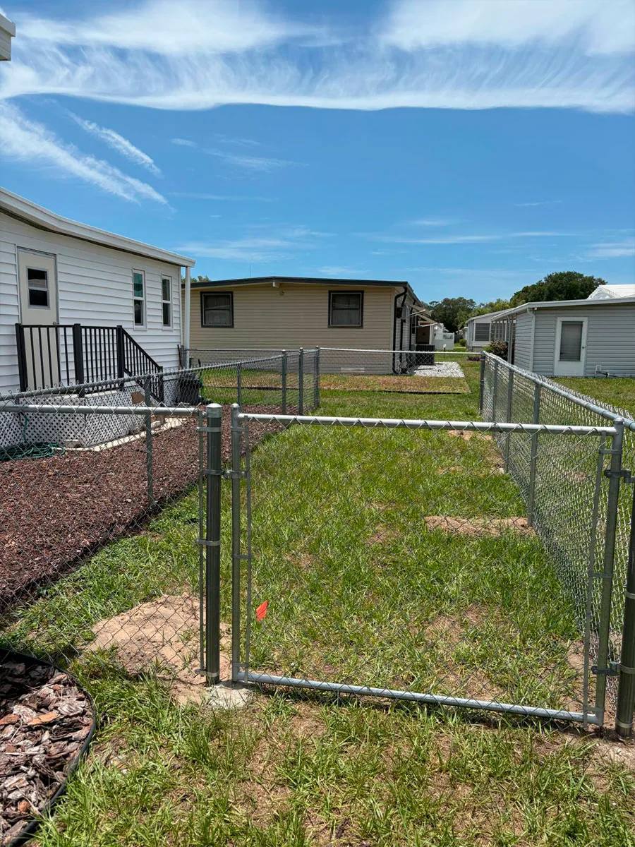 Chain link fence around a residential yard