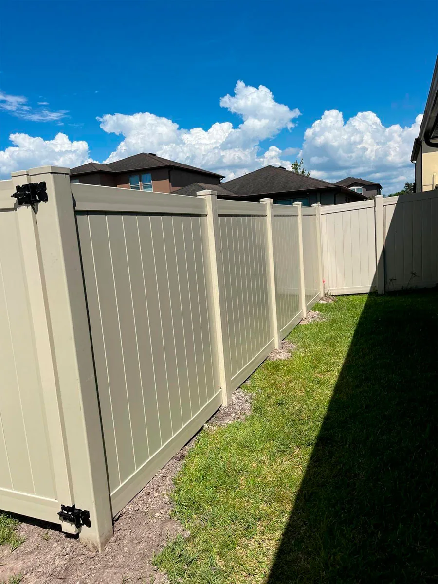 White PVC privacy fence at a home