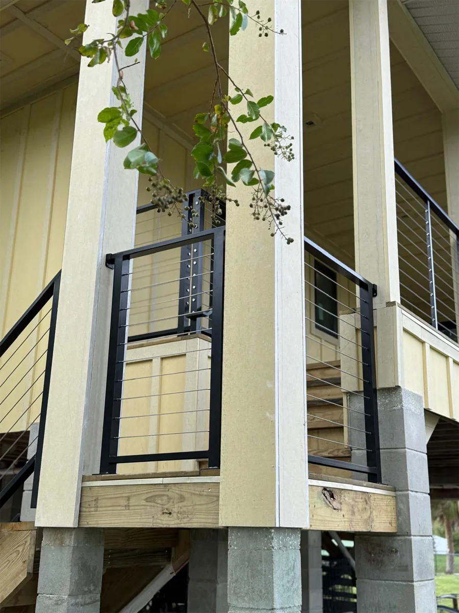 Black metal railings at exterior residential steps