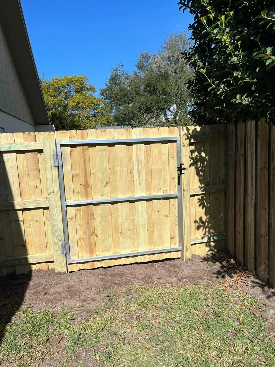 Custom wood access gate at a residence