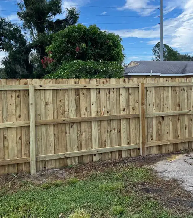Completed natural wood privacy fence
